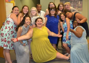 A group of ladies smiles for the camera